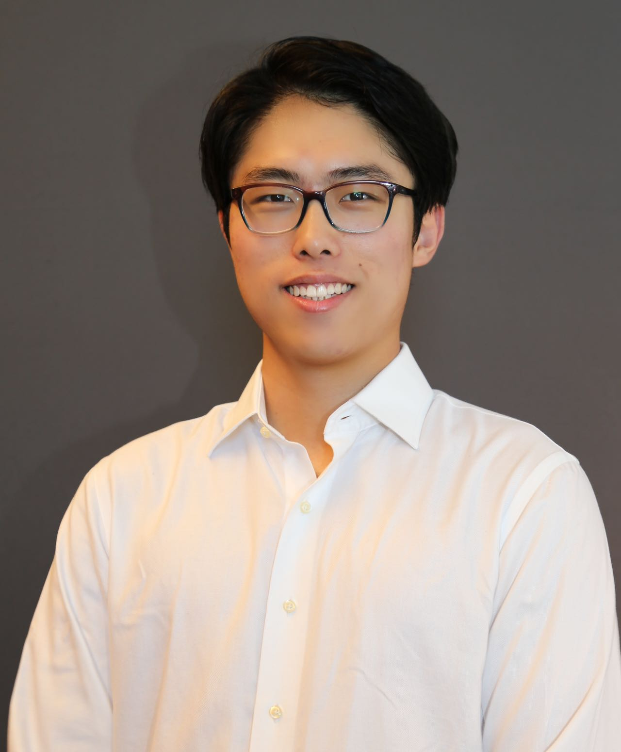 Gavin Lu, a third-year Ph.D. candidate in Biomedical Engineering, smiling and looking toward the camera.