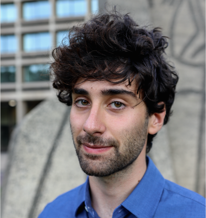 headshot photo of Samuel Nussenzweig wearing a blue shirt