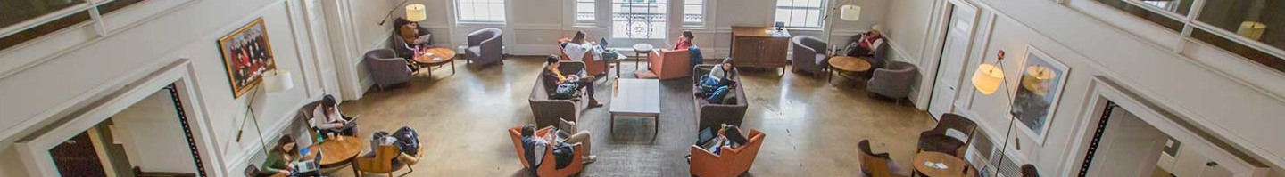 Students studying in a large room